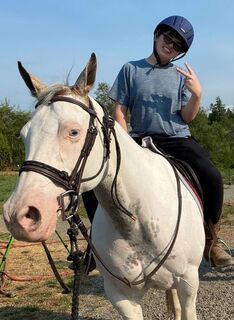 Dalton sitting atop a white horse