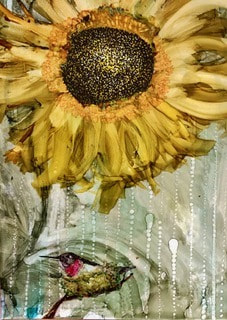 A painting depicting a yellow sunflower with a red-breasted hummingbird sitting on one of its leaves.